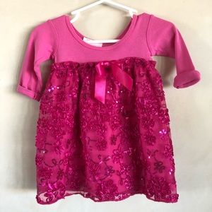 Adorable pink dress with sequin and ribbon details
